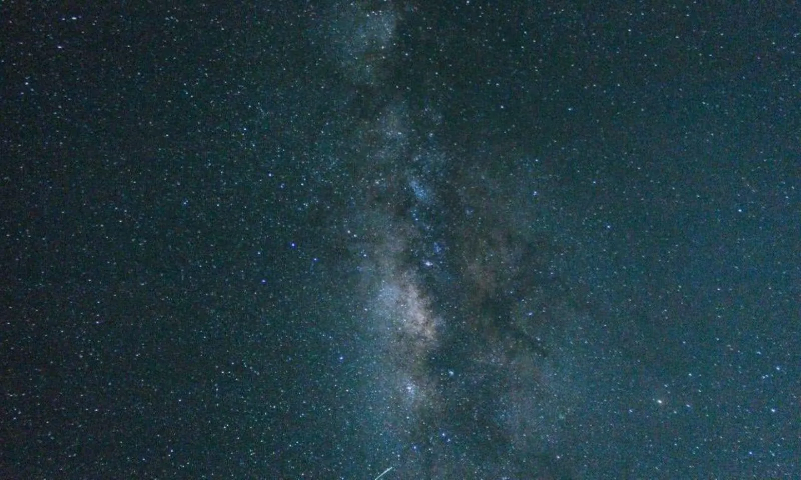 A starry night sky with the Milky Way running through the frame